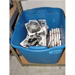 Blue plastic storage tote filled with assorted