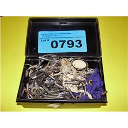 Metal storage box filled with assorted vintage