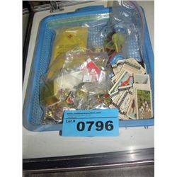 Blue basket filled with assorted collectors pins