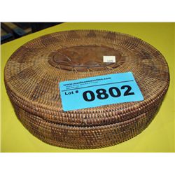 Woven grass lidded basket