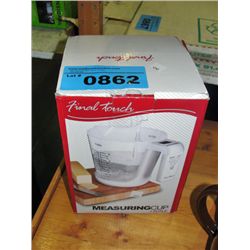 Measuring cup and scale