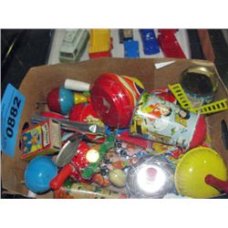 Box full of vintage tin lithograph collectors toys