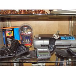 Shelf lot of assorted electronics; palms, portable