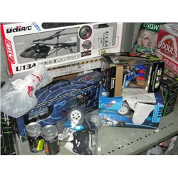 Shelf lot of radio controlled cars and helicopters