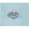 Image 1 : A very good platinum and diamond cocktail ring set with a single 10mm. South Sea pearl of fine color