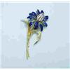 Image 1 : A fine French 18kt yellow gold and diamond flower brooch. Petals with blue enamel decoration. Circa.