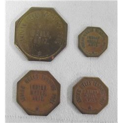 Four 1900 Indian Wells Trading Post Tokens