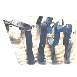 2 pairs of iron spurs