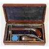 Image 1 : A 19th Century Pepperbox Revolver, with walnut grip, scroll engraved stock, and plain cylindrical...