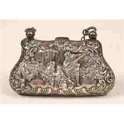 An Edwardian Silver Purse, embossed figures and scrolls, Birmingham 1901, 9.5 cm  See illustratio...