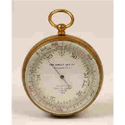 A T. Wheeler Compensated Pocket Barometer, with a silvered dial in a brass case,  See illustratio...