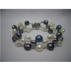 76 CTW  BLACK AND WHITE SIOPAO FLAT PEARL BRACELET