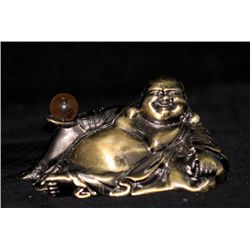 BUDDHA LAYING DOWN ON ONE SIDE STATUE; WIDE 3.5 IN; DEE