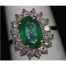 14K GOLD OVAL EMERALD AND DIAMOND RING