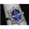 Image 1 : 14K GOLD OVAL TANZANITE AND DIAMOND RING