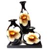 Image 1 : DECORATIVE FLORAL CLAY CANDLE VASES SET