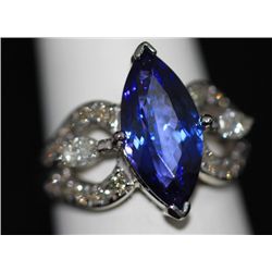 14K GOLD MARQUISE TANZANITE AND DIAMOND RING