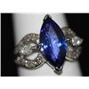 Image 1 : 14K GOLD MARQUISE TANZANITE AND DIAMOND RING