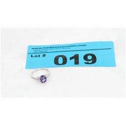 Sterling Silver Ring set with Amethyst & 2 Side