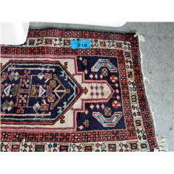 Approx 2F by 7F hand knotted persian area rug