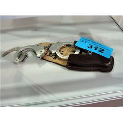 Pair of Kyungchang handcuffs with leather belt