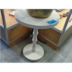 contemporary white round pedastol table