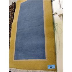 Approx 3F by 6F decorative wool area rug
