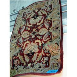 Approx 3F by 4F multi colored wool area rug