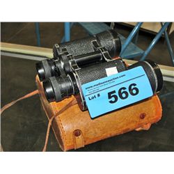 Pair of binoculars with leather case