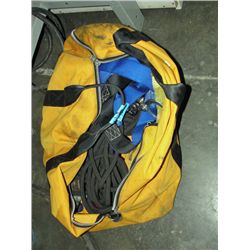 Yellow duffel bag full of assorted safety