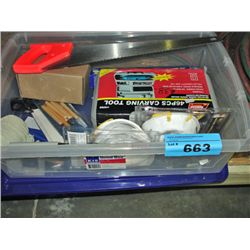 Plastic storage bin of assorted tools hardware and