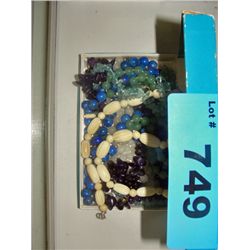 Box of costume jewelry necklaces