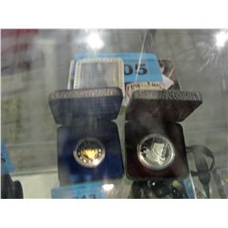 2 royal canadian mint collectors coins;
