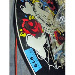 Water sport skim board with skull and dagger motif