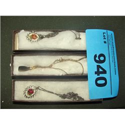 3 necklaces with pendants