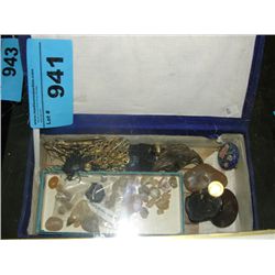Blue box with assorted polished stones and costume