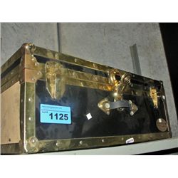 Empty storage trunk, black and gold