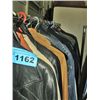 Image 1 : Entire clothing rack filled with assorted jackets