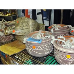 Shelf lot of assorted ceramic hanging planters