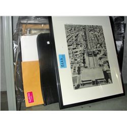 Shelf lot of prints pictures and artists portfolio