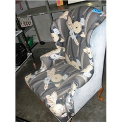 Floral upholstered wing back chair
