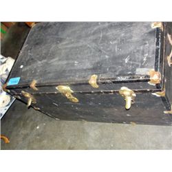 Large black steamer trunk