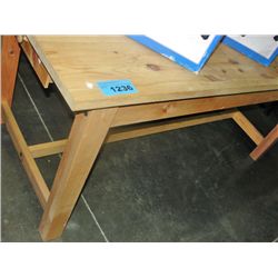 Unfinished knotty pine harvest table