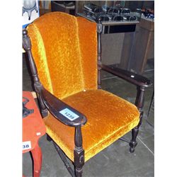 Vintage upholstered orange wooden arm chair