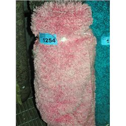 Small pink shag area rug
