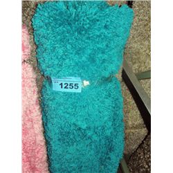 Small turquoise shag area rug