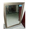 Image 1 : Elegantly framed bevelled wall mirror