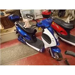 SCOOTER - ELECTRIC - BLUE SHOW ROOM FLOOR MODEL - 5KM - retail ~$1795.00 - comes with luggage rack a