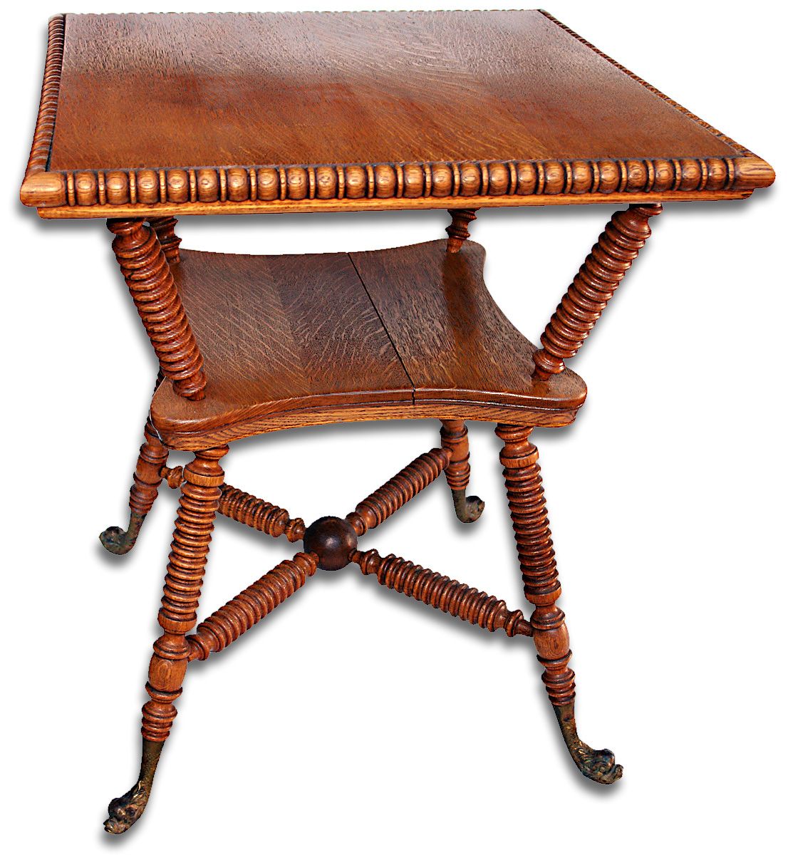 Solid oak fancy parlor table with metal serpent feet