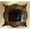 Image 1 : Phenomenal hand carved mahogany hanging mirror with the original beveled mirror
